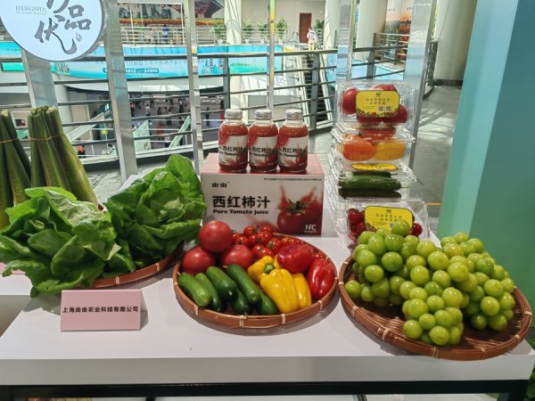 邦尼配资 山海情牵，沪上农展连起地产鲜与老区味